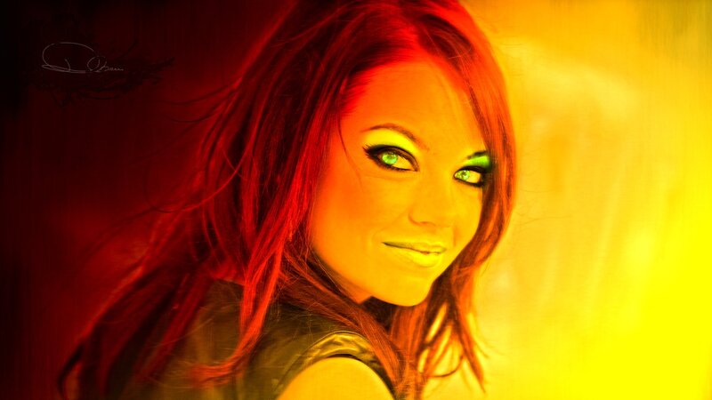 woman with red hair and green eyes
