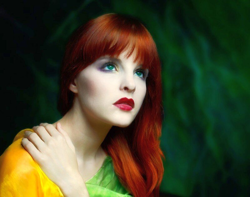 woman with red hair and green eyes