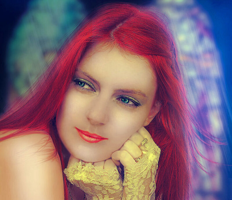woman with red hair and green eyes