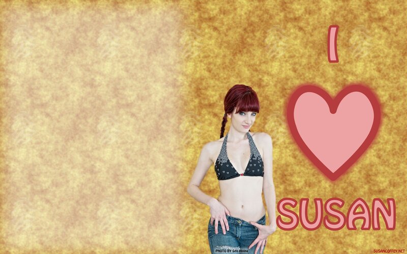 woman with red hair and heart graphic