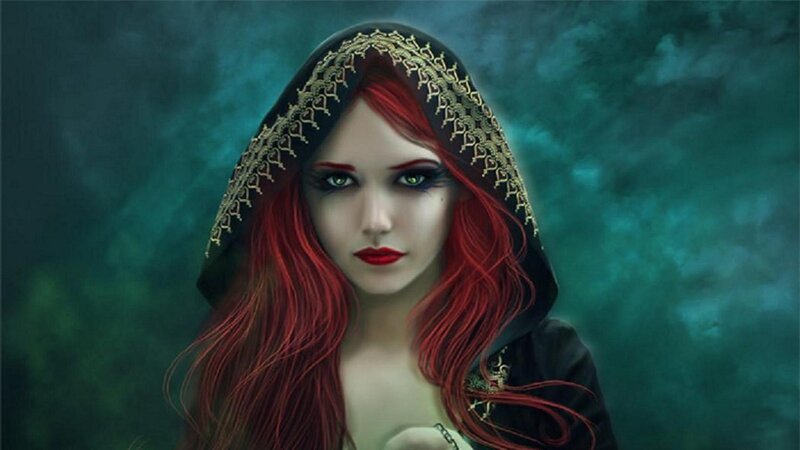 woman with red hair and hood