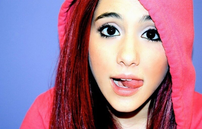 woman with red hair and hoodie