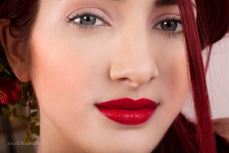 woman with red hair and lipstick