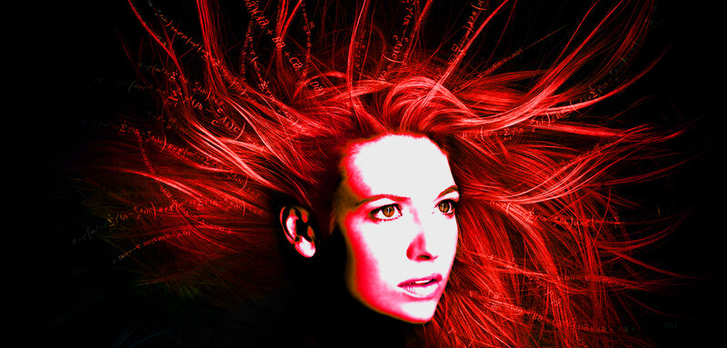 woman with red hair and math equations