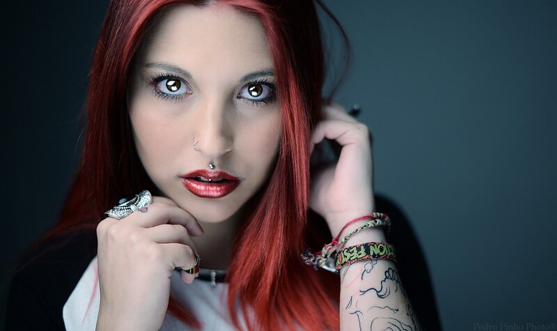 woman with red hair and piercings