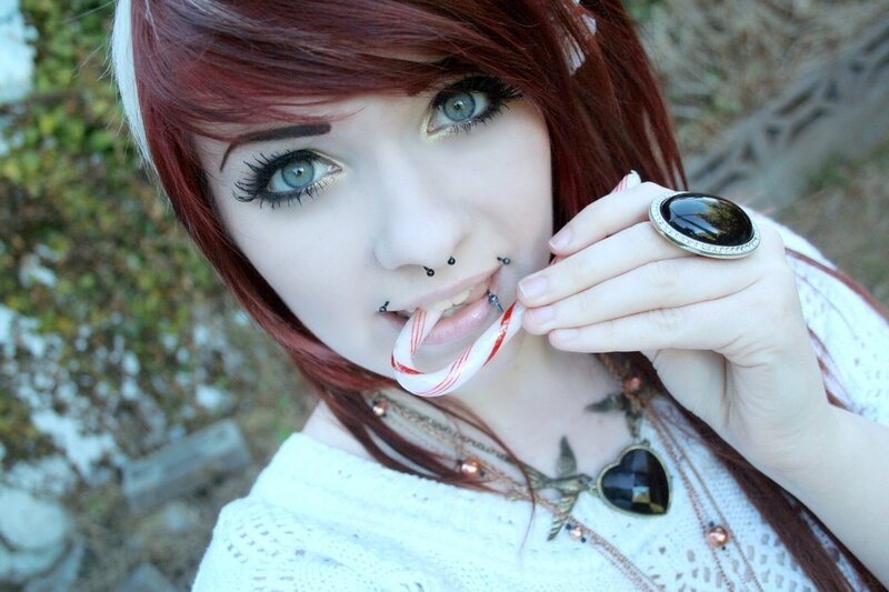 woman with red hair and piercings