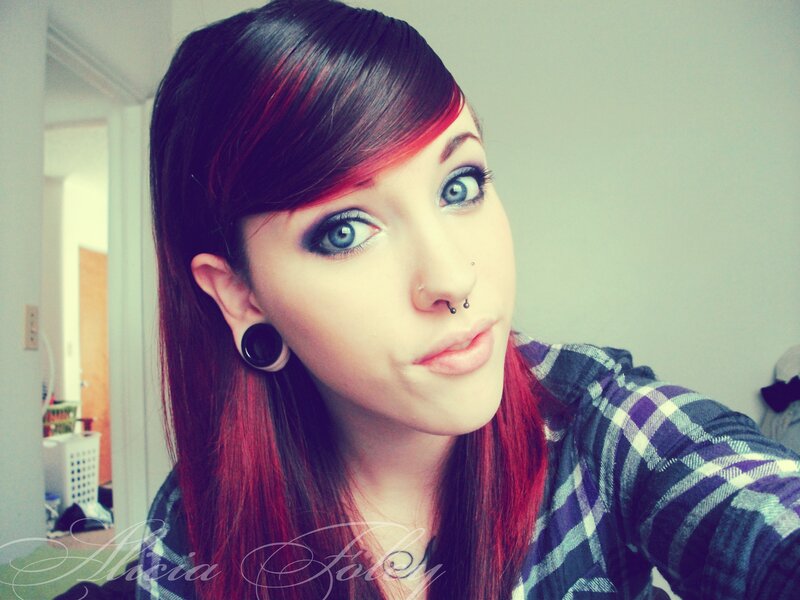 woman with red hair and piercings