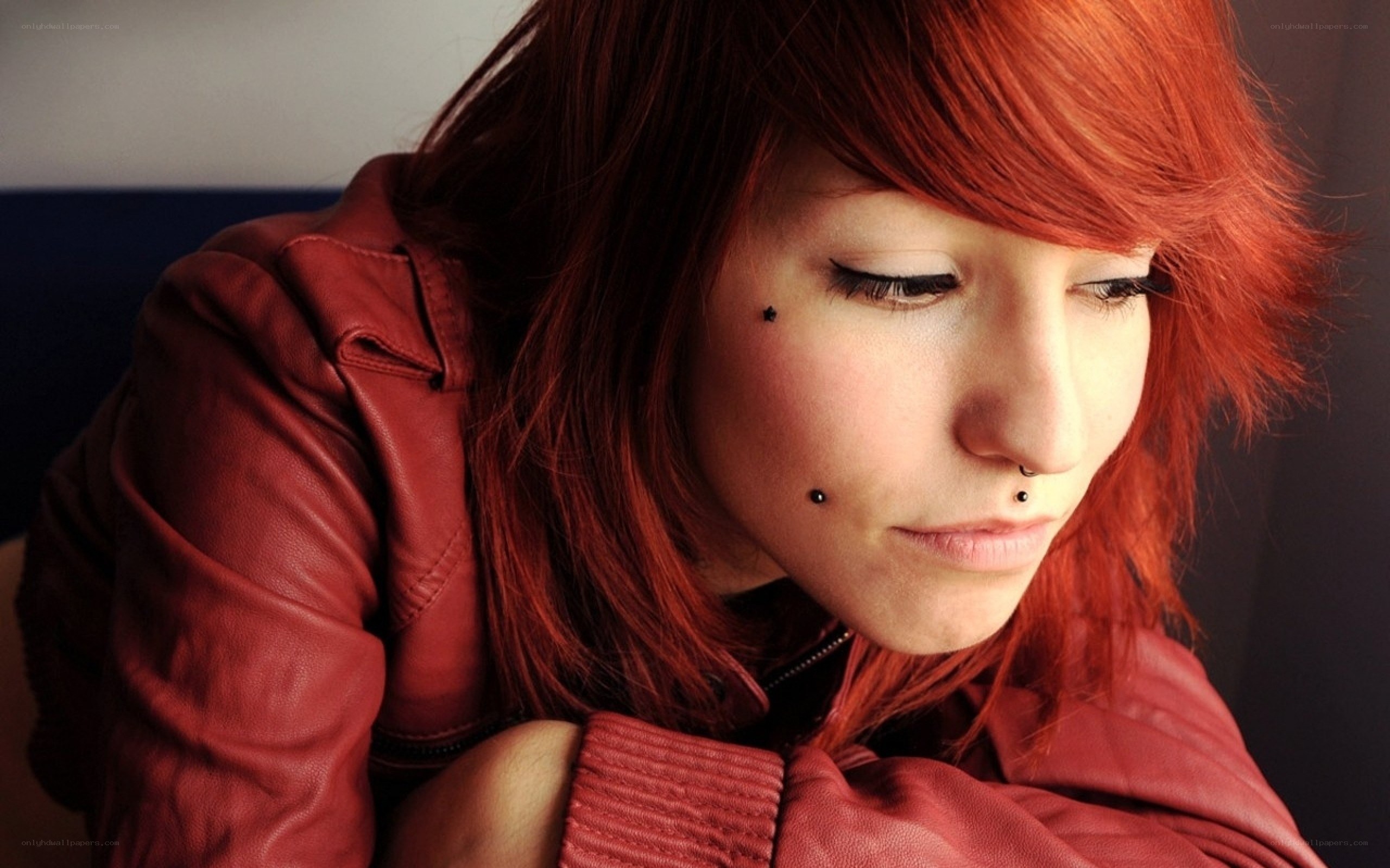 woman with red hair and piercings