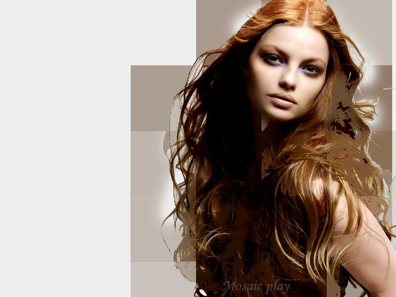 woman with red hair and purple eyes