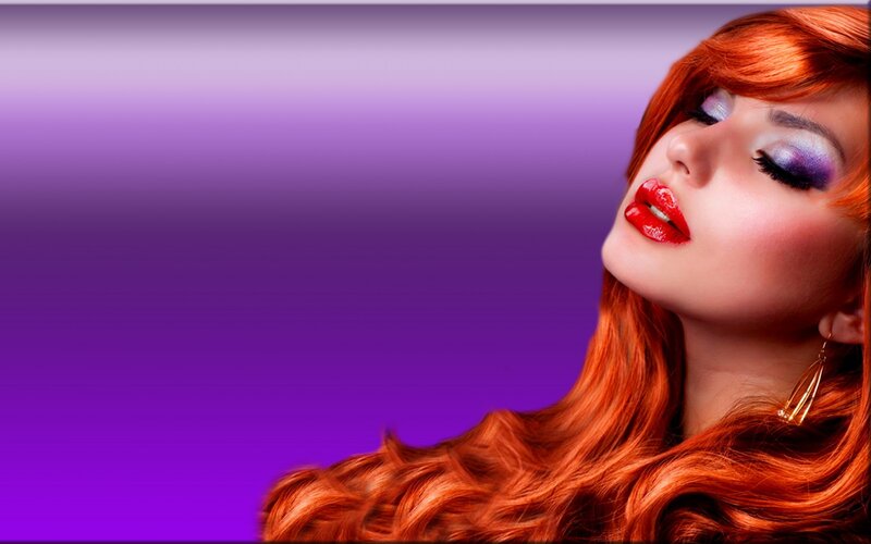 woman with red hair and purple makeup