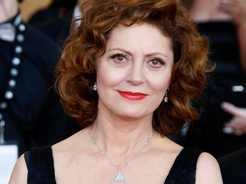 woman with red hair and red lipstick