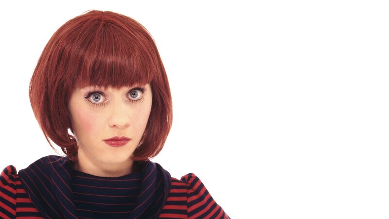 woman with red hair and striped shirt
