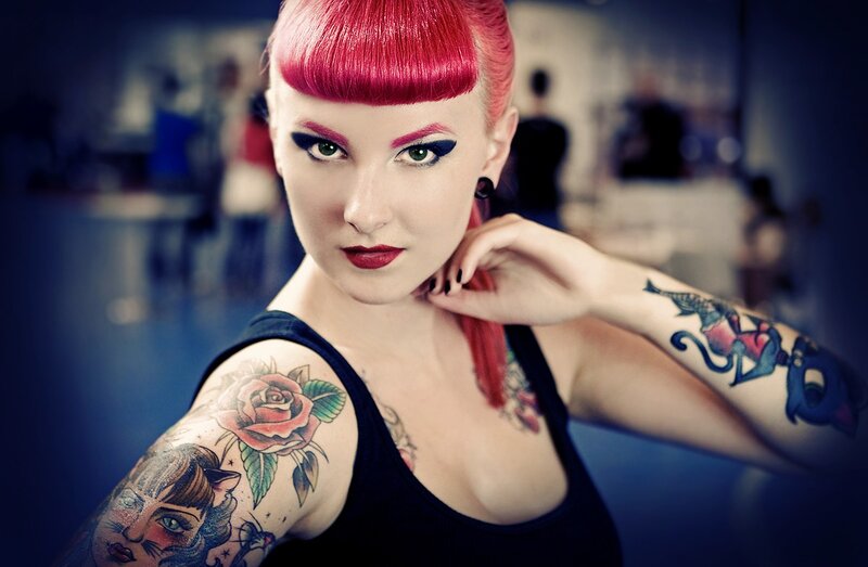 Woman with Red Hair and Tattoos — Dramatic, Photograph