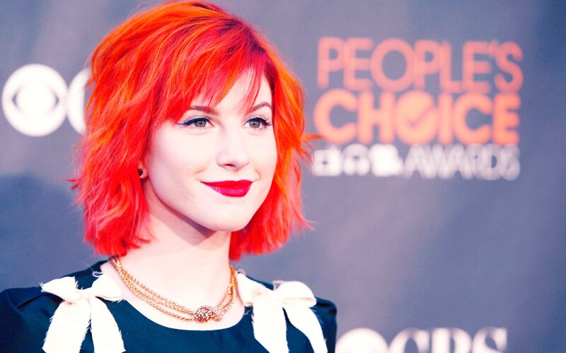 woman with red hair at awards