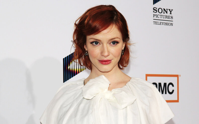 woman with red hair at event