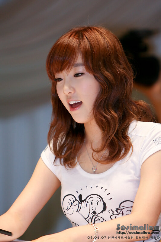 woman with red hair at event