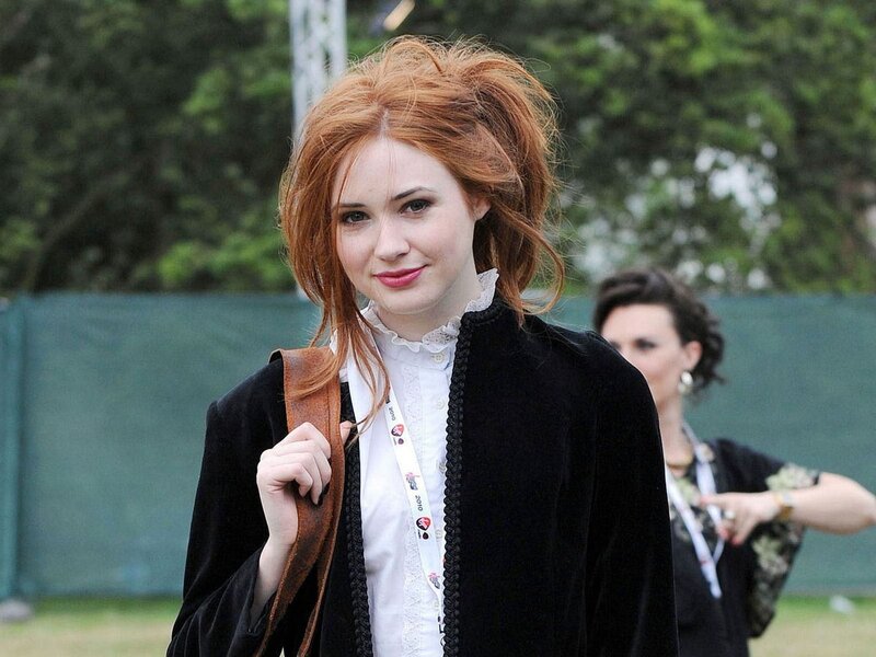 Woman with red hair at outdoor event