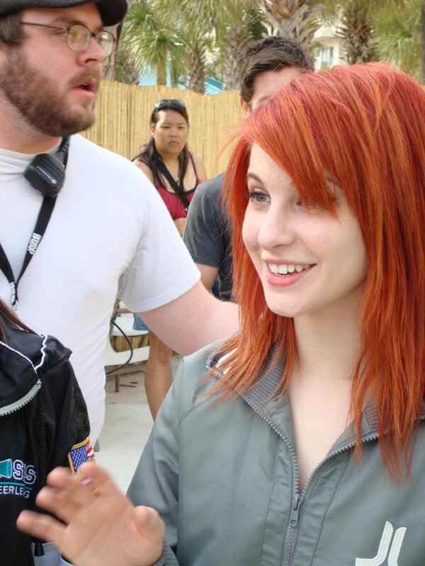 woman with red hair at outdoor event