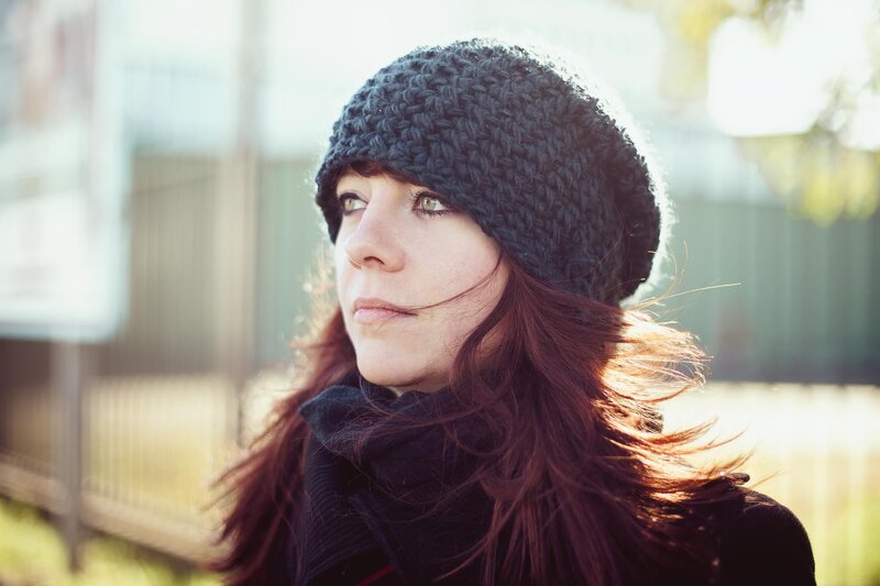 Woman with Red Hair — Black, Contemplative, Afternoon