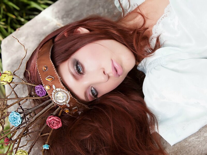Woman with Red Hair — Brown, Serene, Afternoon