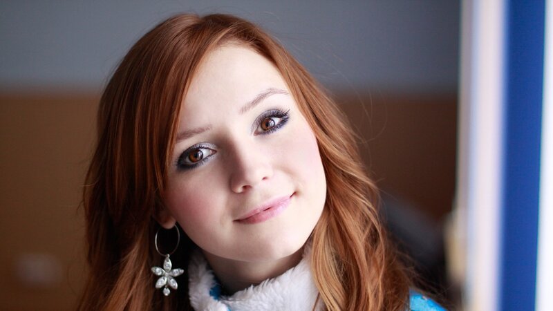 Woman with Red Hair — Calm, Photograph, Earring, Coat