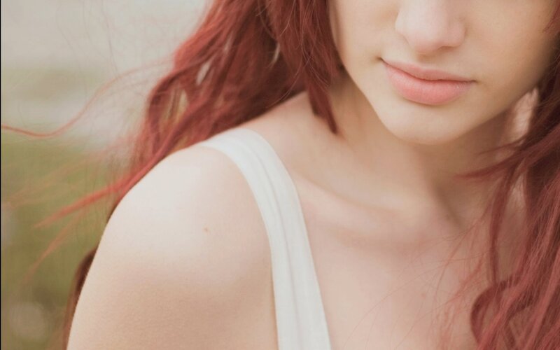 woman with red hair close-up