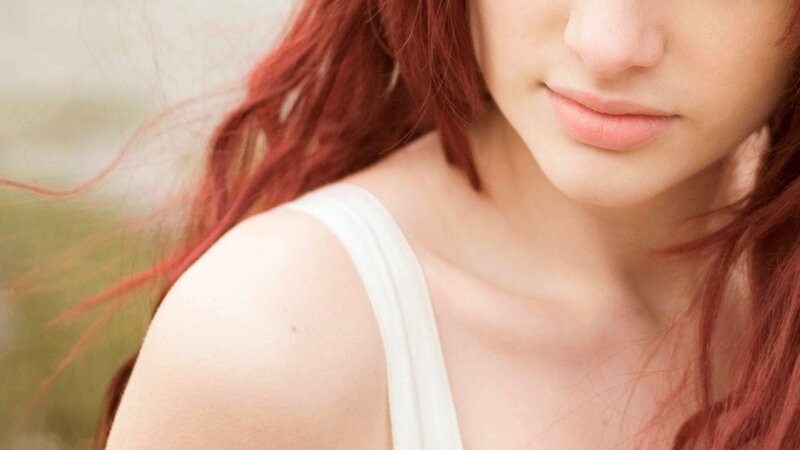 woman with red hair close-up