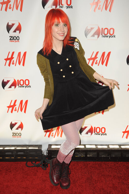 Woman with Red Hair — Confident, Photograph, Red Carpet, Backdrop, Boots