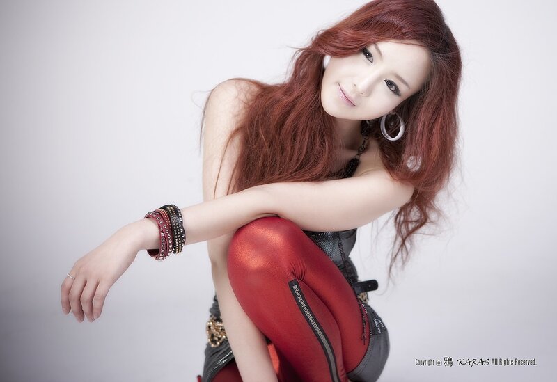 Woman with Red Hair — Confident, Photograph, Red Pants