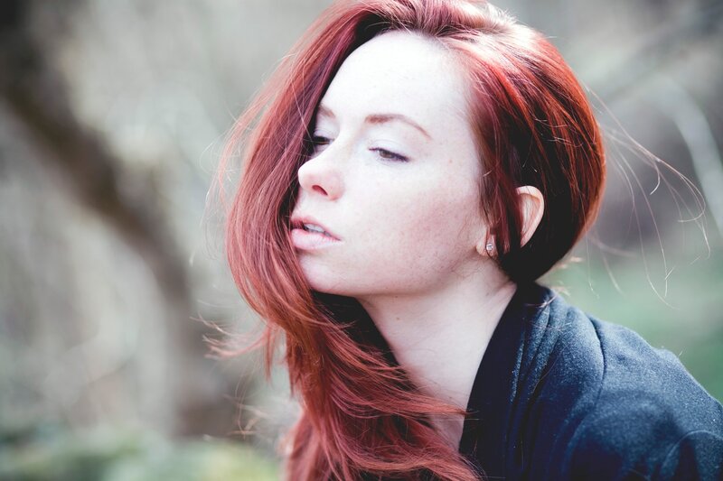 Woman with Red Hair — Contemplative, Photograph, Earring