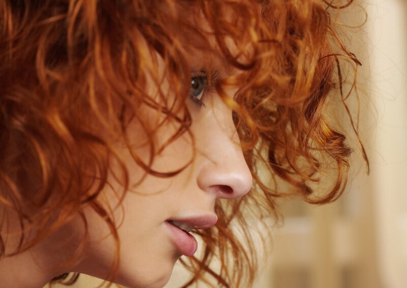 Woman with Red Hair — Contemplative, Photograph, Face, Profile