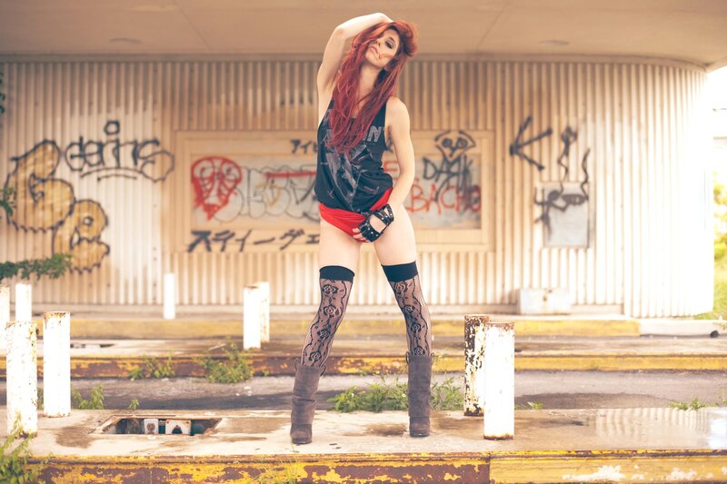 Woman with Red Hair — Dramatic, Afternoon, Photograph, Graffiti Wall