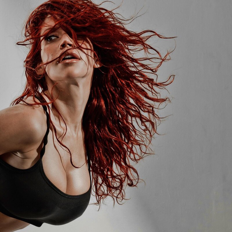 Woman with Red Hair — Dramatic, Photograph, Black Top, Gray
