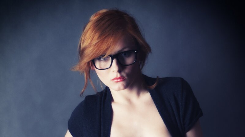 Woman with Red Hair — Dramatic, Photograph, Glasses, Black Top