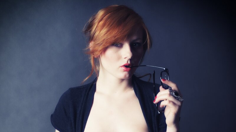 Woman with Red Hair — Dramatic, Photograph, Glasses
