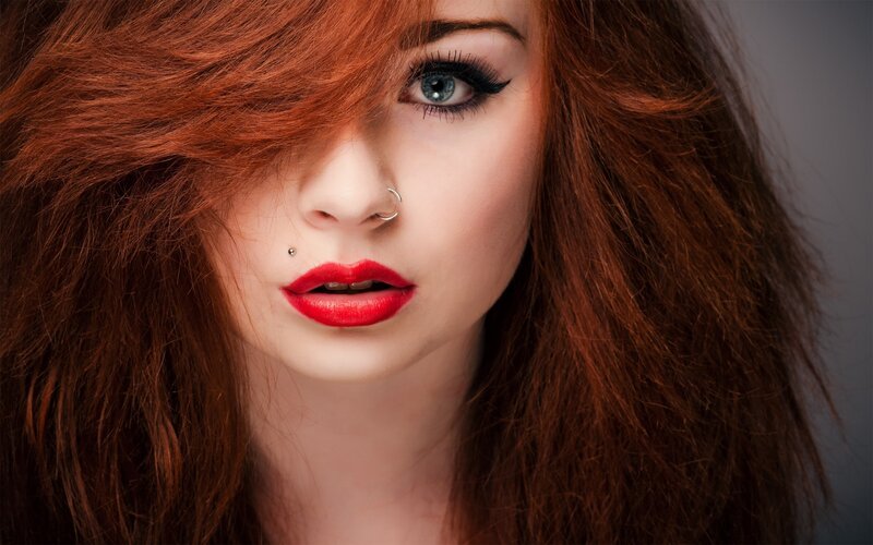 Woman with Red Hair — Dramatic, Photograph, Red Lipstick, Piercings, Blue Eyes