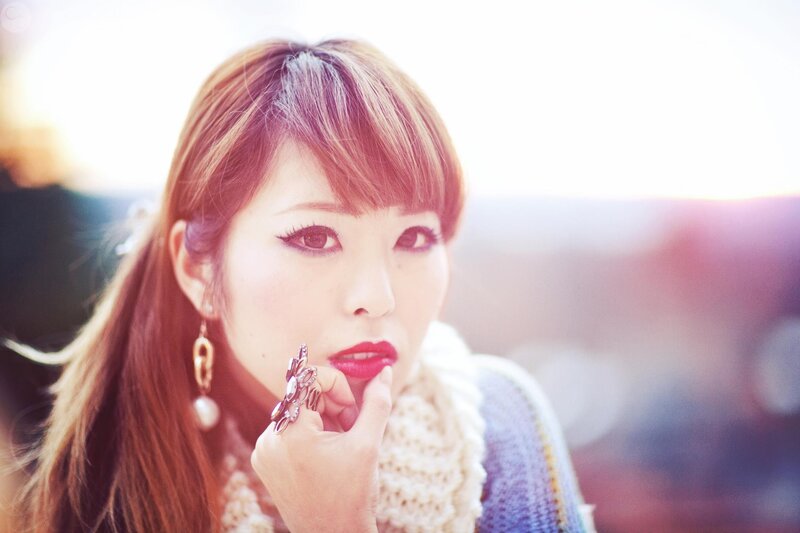 Woman with Red Hair — Dramatic, Sunset, Photograph, Earring, Scarf