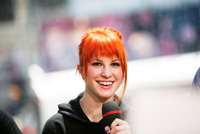Woman with Red Hair — Happy, Photograph, Microphone