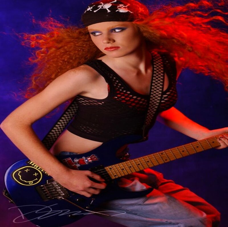 Woman with Red Hair Holding Guitar — Blue