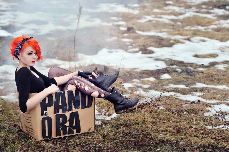 Woman with red hair in a box