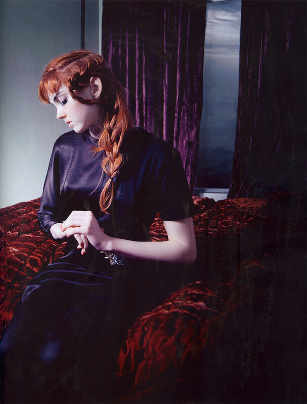 woman with red hair in braid