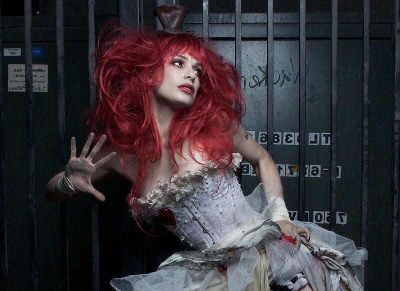 Woman with Red Hair in Cage — Dramatic, Photograph