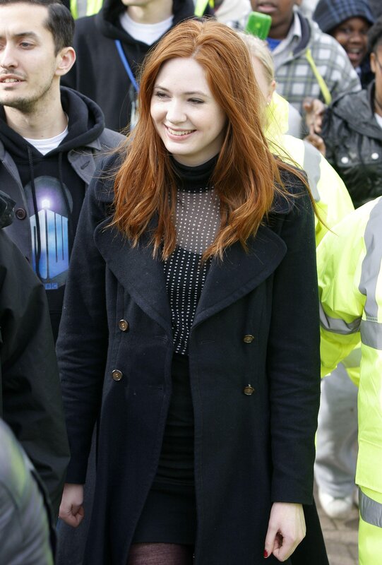 Woman with red hair in crowd