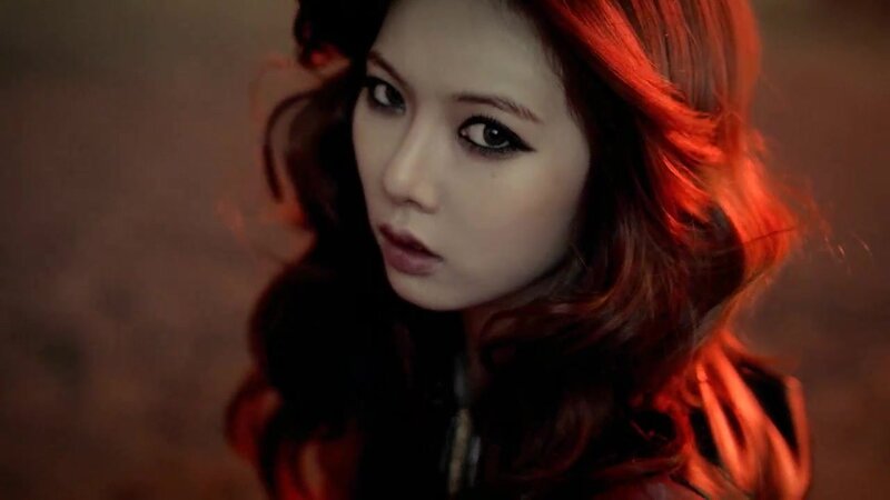 woman with red hair in dramatic lighting