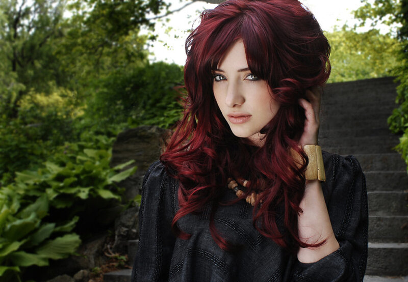 woman with red hair in garden