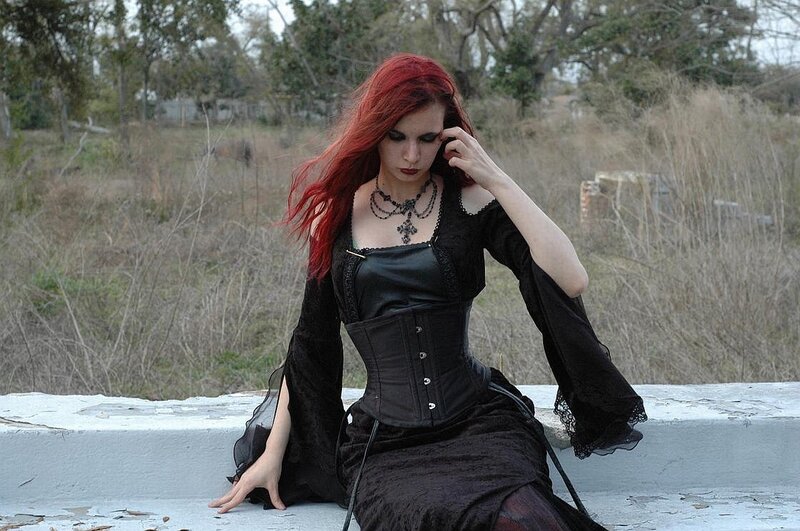 woman with red hair in gothic dress