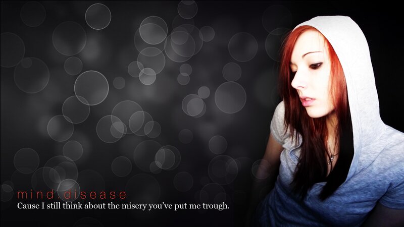 woman with red hair in hoodie