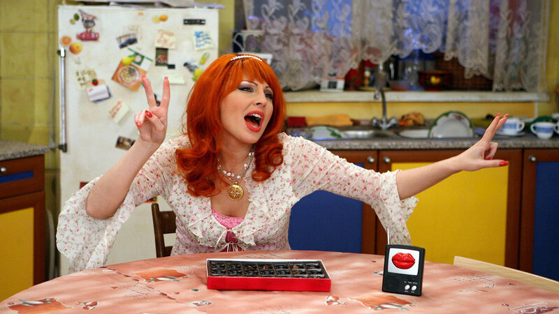Woman with Red Hair in Kitchen