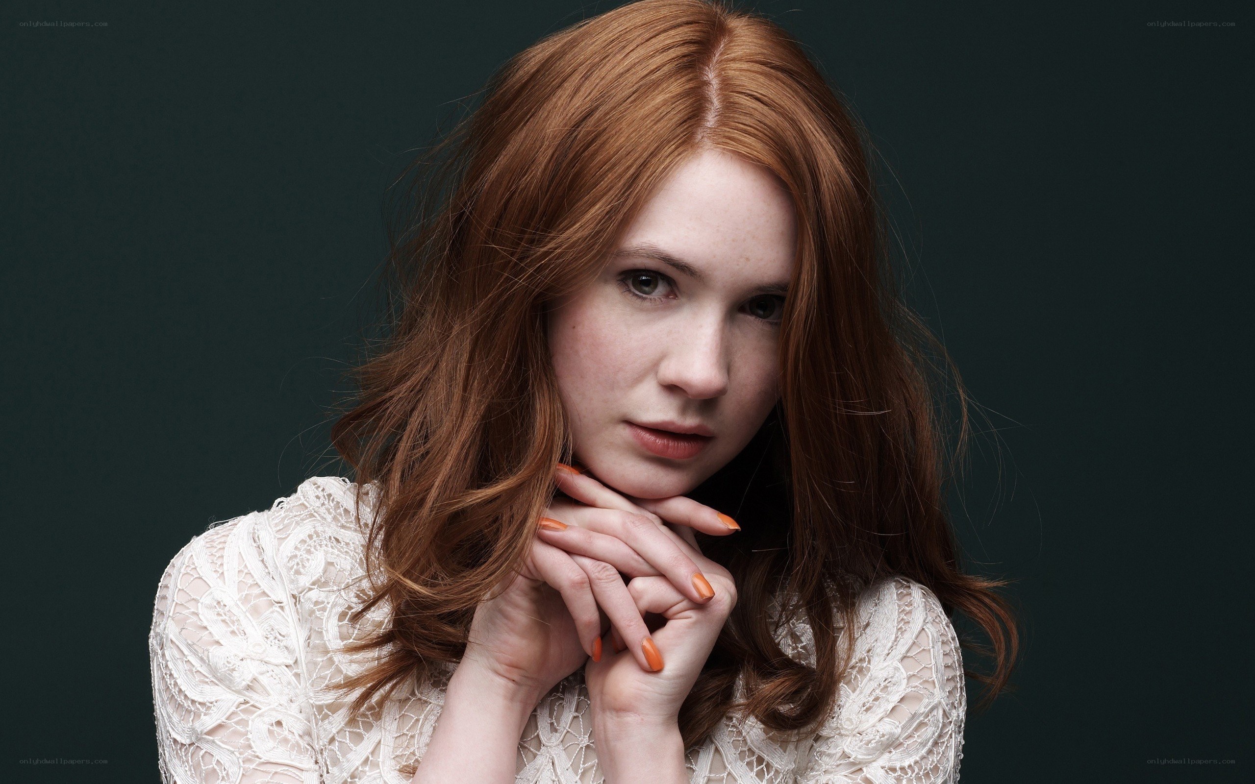 woman with red hair in lace dress