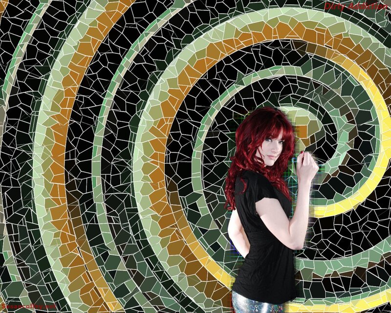 woman with red hair in mosaic tunnel
